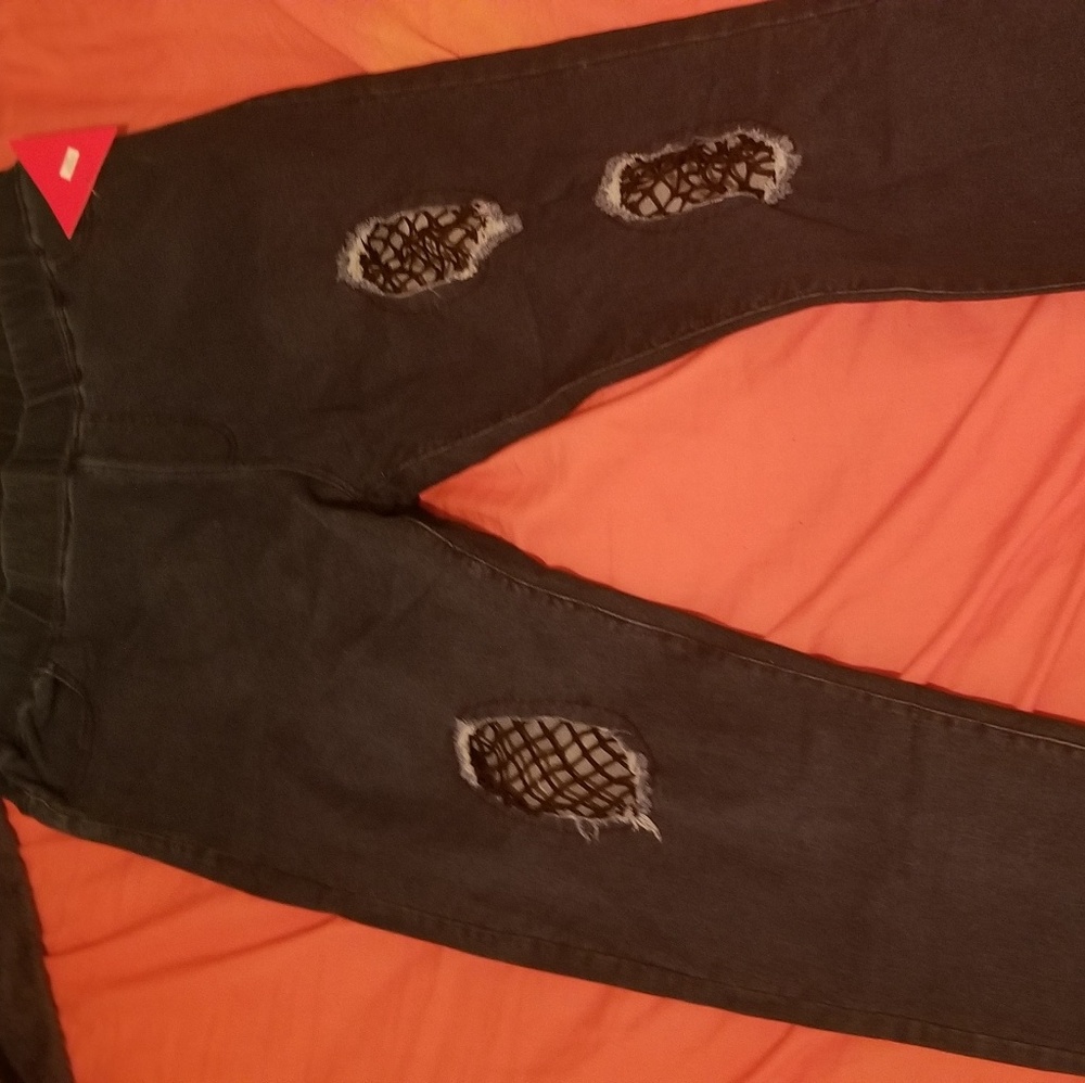 Dark denim ripped fishnet jeggings